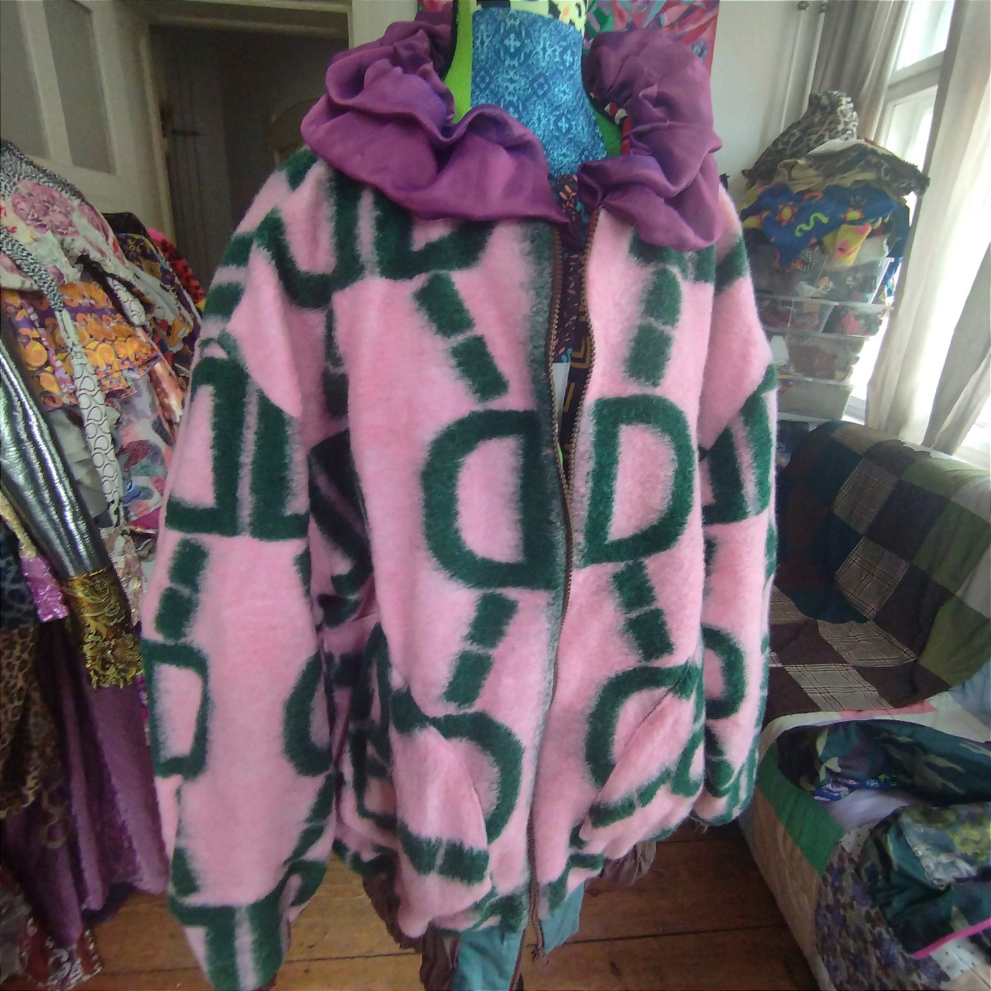 Plush pink harlequin bomber