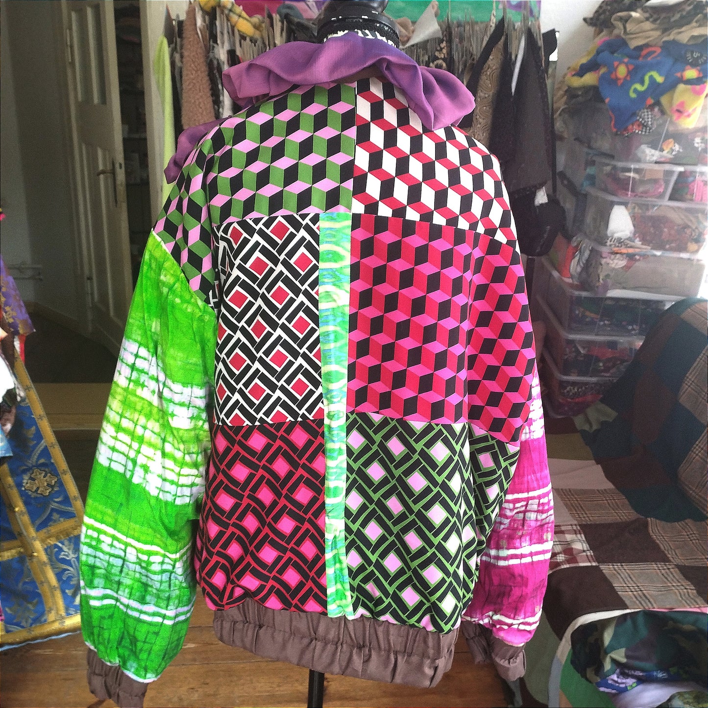 Plush pink harlequin bomber