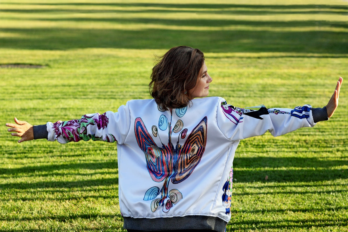 #iwearitmyself Vibrant and stylish bomber jacket showcasing a colorful personalized design, featuring bold patterns and customized elements. The jacket has a sleek modern fit, ribbed cuffs, and a unique graphic for a distinctive look. Ideal for those seeking a statement outerwear piece with a creative, tailored touch.